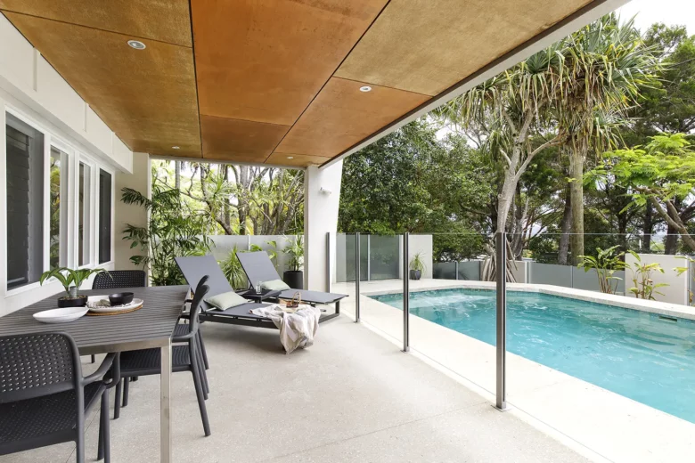 Pool and deck chairs at Noosa holiday house