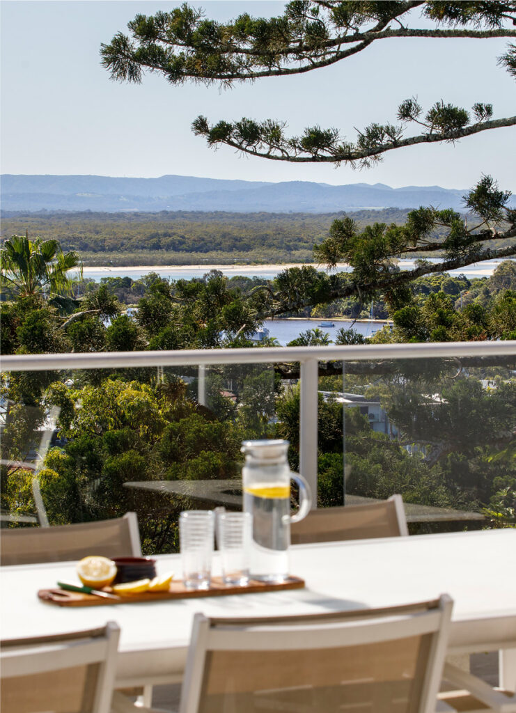 Drinks and snacks on a table overlooking Noosa river